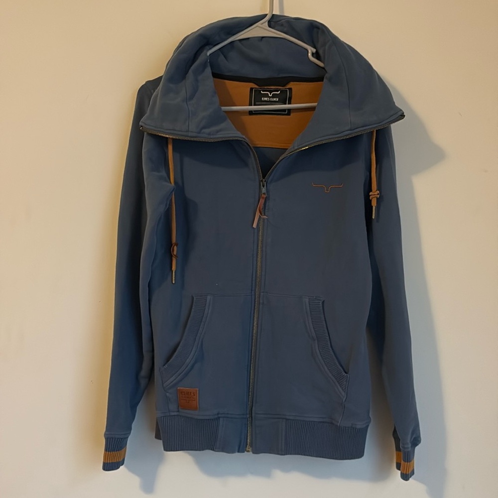 Kimes ranch jacket. High collar with pull cords,